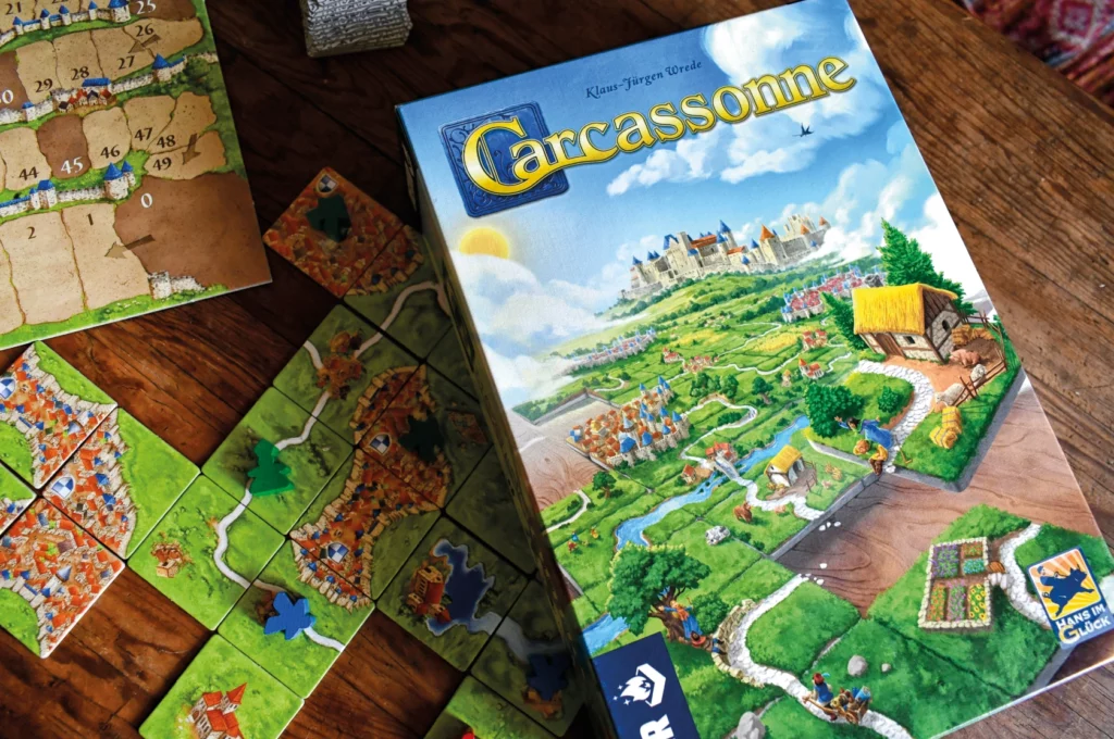 Cartaz do evento Devir no Alegro Sintra com destaque para jogos de tabuleiro e o jogo Carcassonne, com datas 18 e 19 de julho.